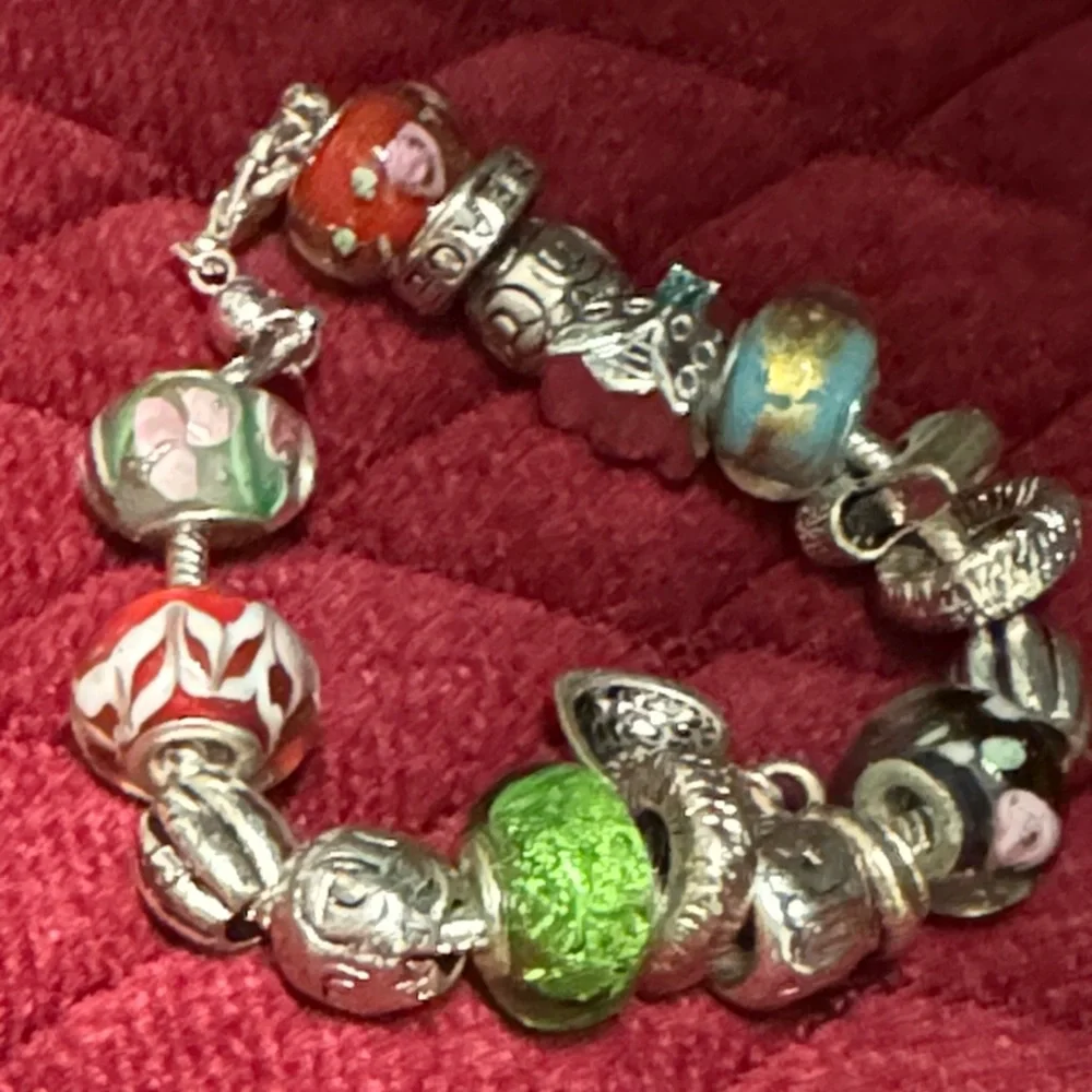 2 glass Bead and Elegant Silver Bracelets. In great condition.